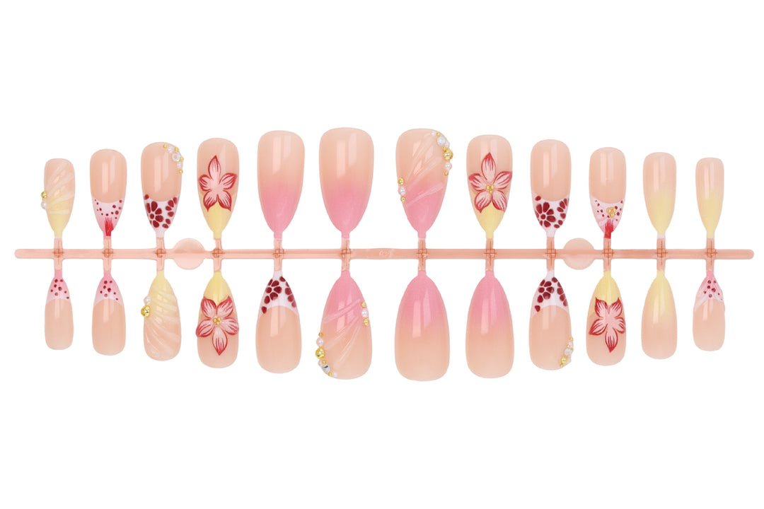 Art nail set with creative floral design and glittering accents Kalsten