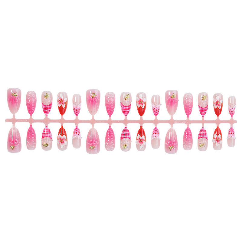 Acrylic nail set with luxurious glitter and flower accents Kalsten