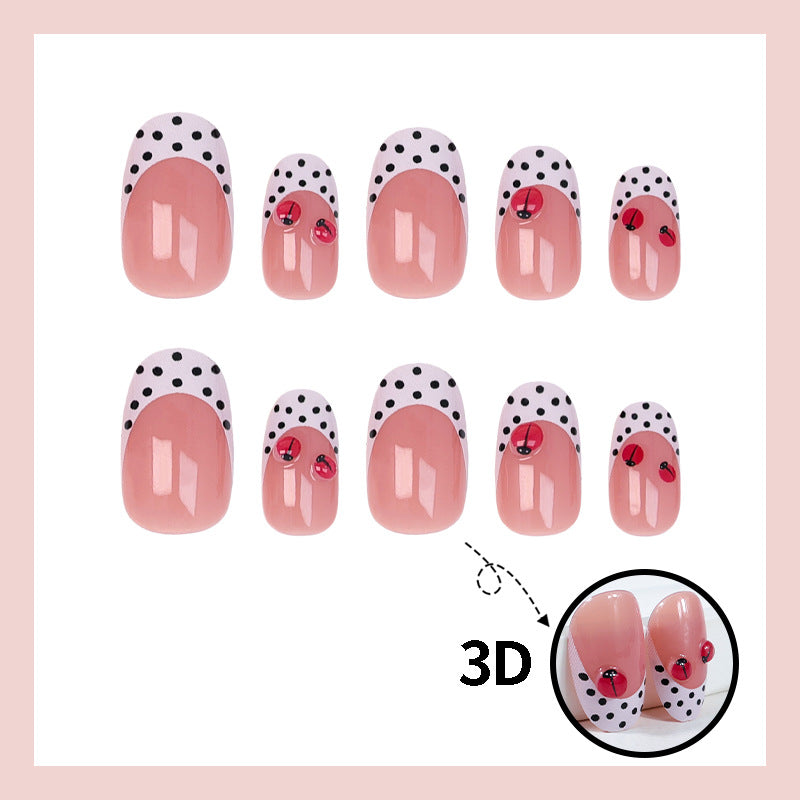 Artificial nail set with playful dots and eye-catching accents Kalsten