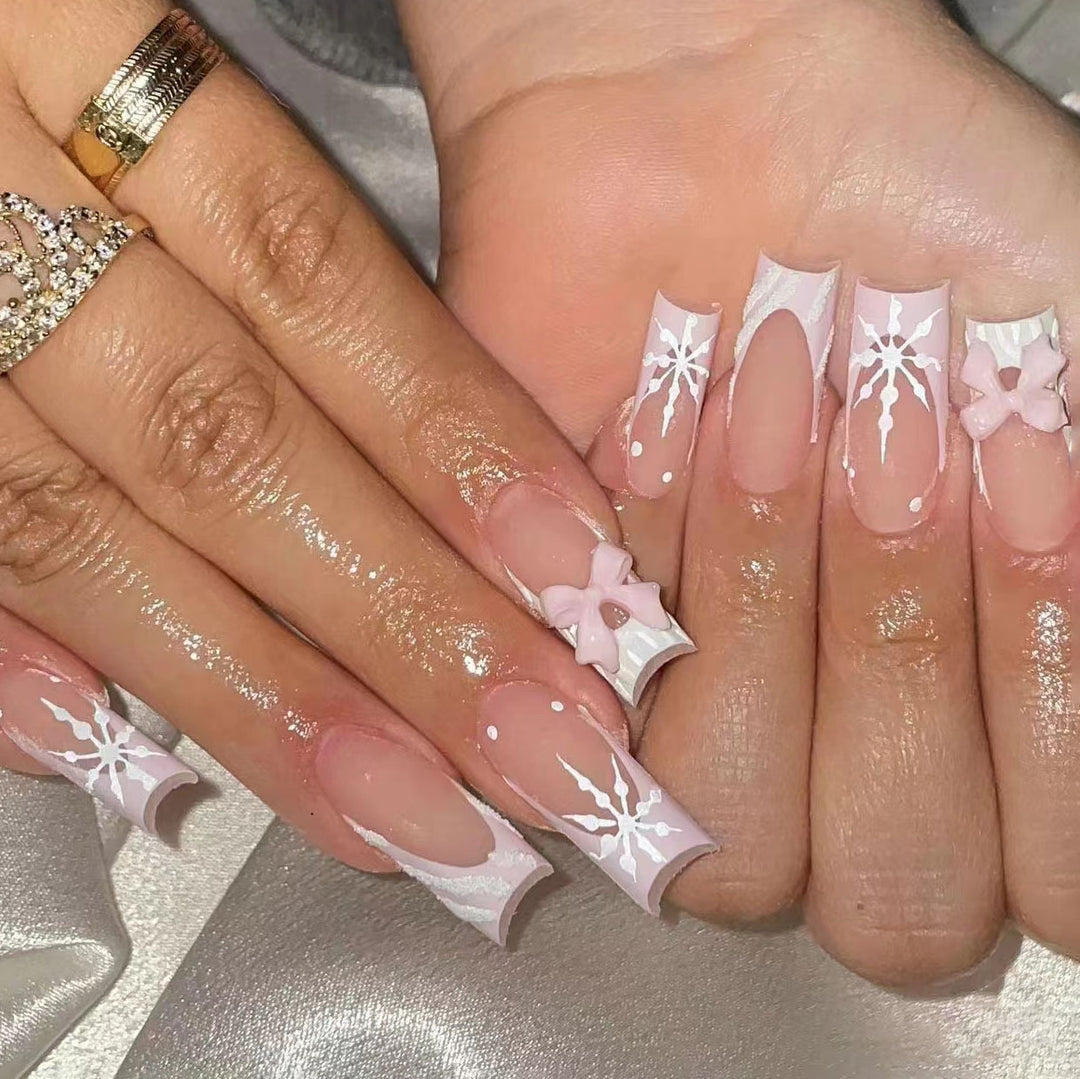 Artistic Press-On Nail Set with Floral and Snowflake Designs
