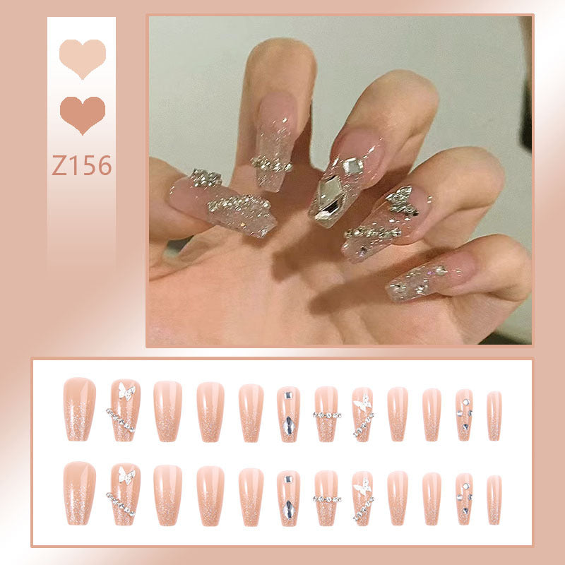 Glamorous artificial nails with sparkling rhinestones and elegant designs Kalsten