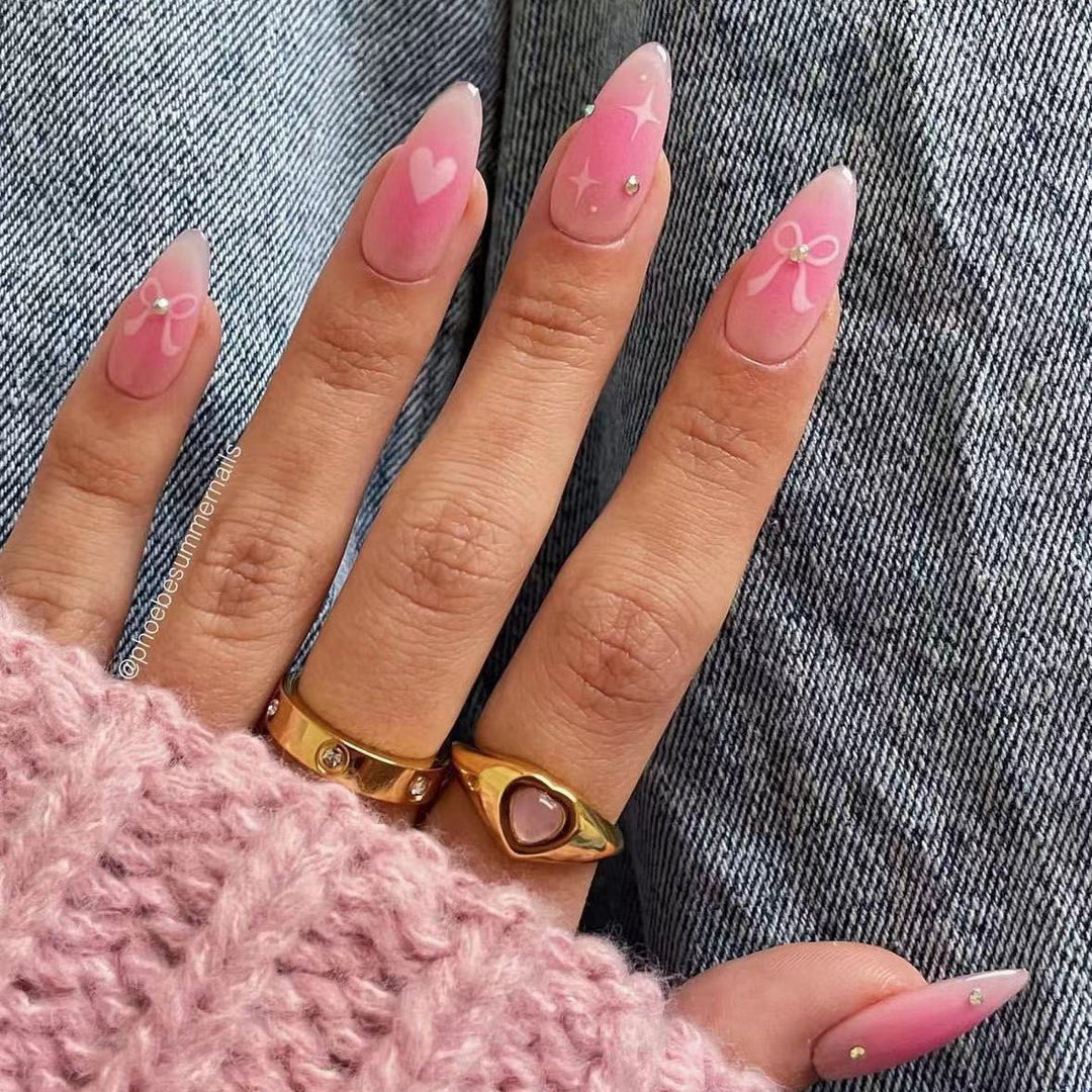 Artificial nail set with romantic heart design and embellished accents Kalsten
