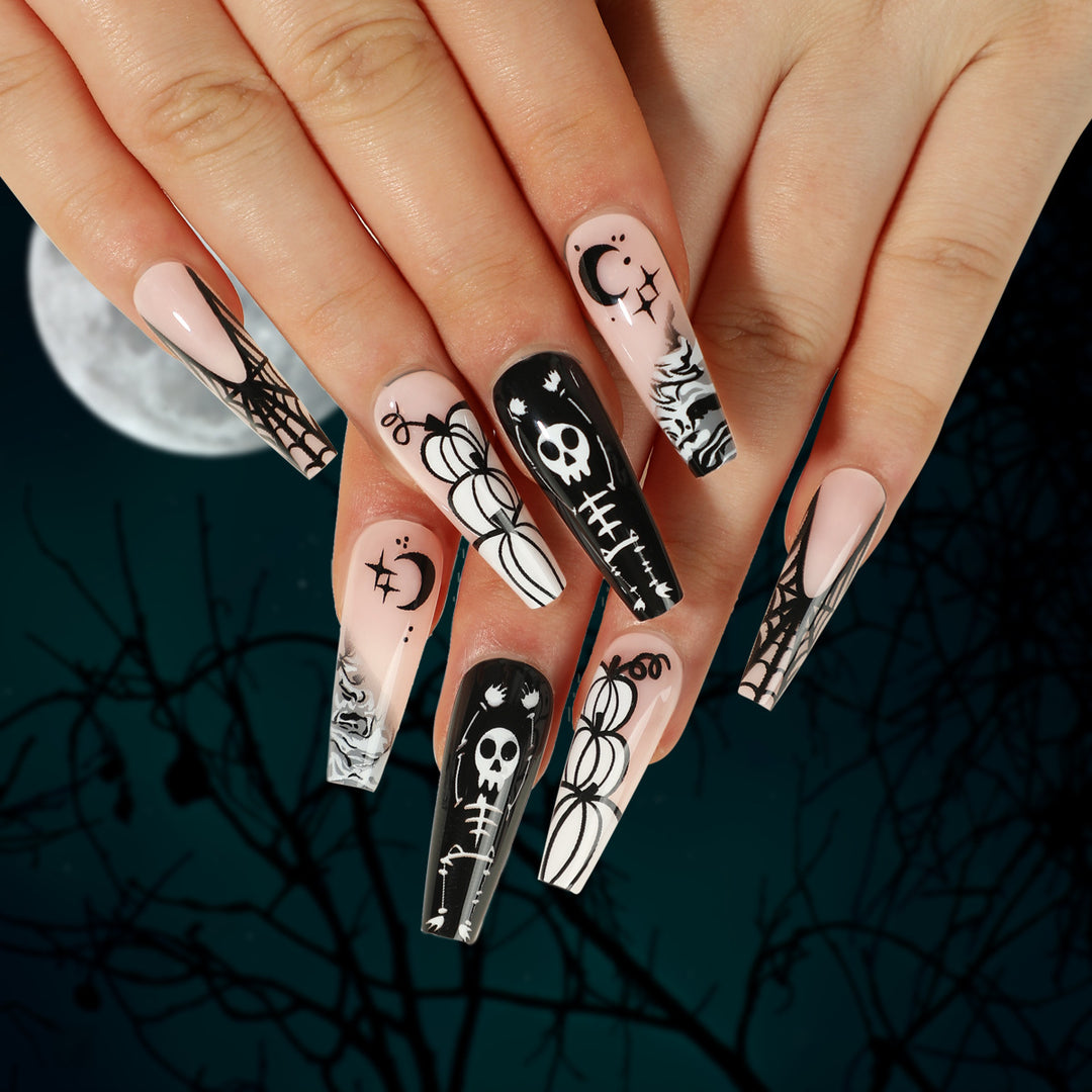 Artificial nail art in Halloween style with graffiti designs Kalsten