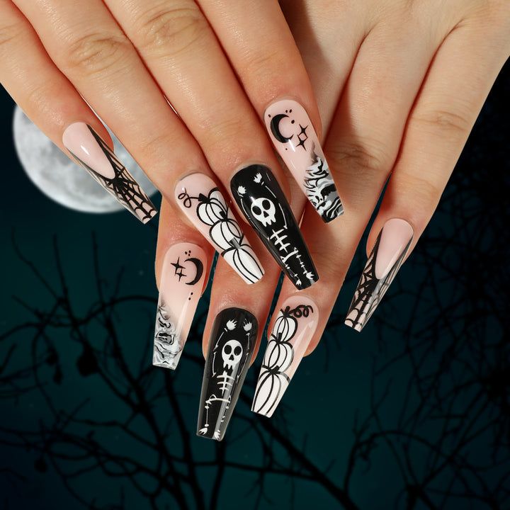 Artificial nail art in Halloween style with graffiti designs Kalsten