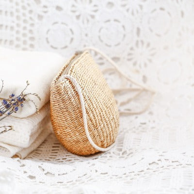 Handcrafted basket bag in unique half-moon design Kalsten