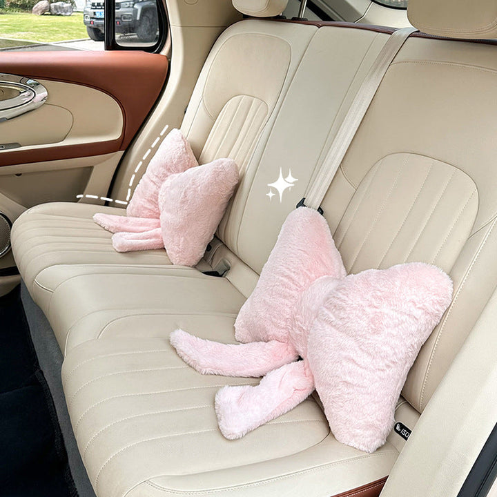 plush bow-shaped decorative throw cushion with long tails and faux-fur texture Kalsten