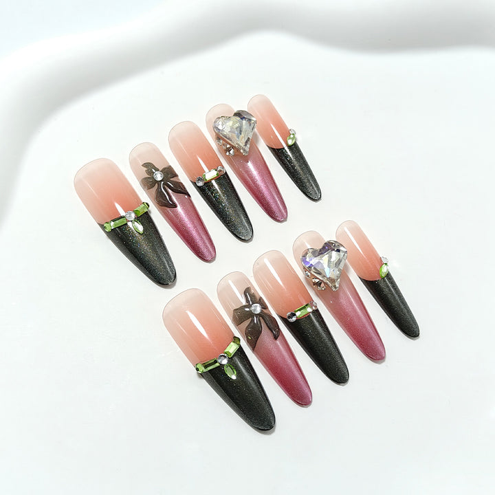 Artificial nails with elegant tip design and glitter accents Kalsten