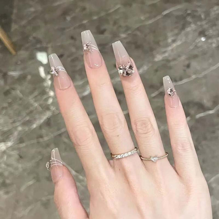 Art nail set with filigree decorations and glamorous accents Kalsten