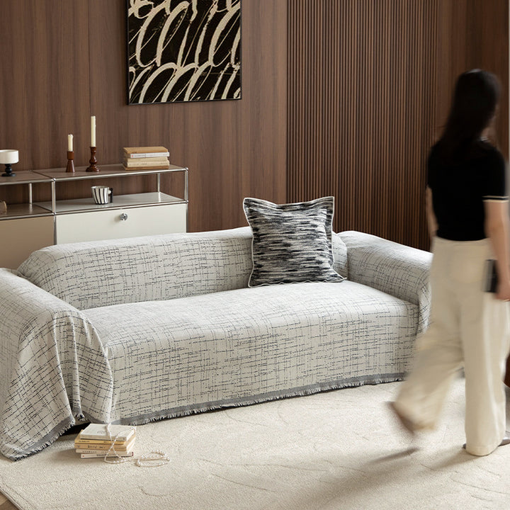 Universal sofa throw made of woven cotton blend with fringes and gentle upholstery cover Kalsten