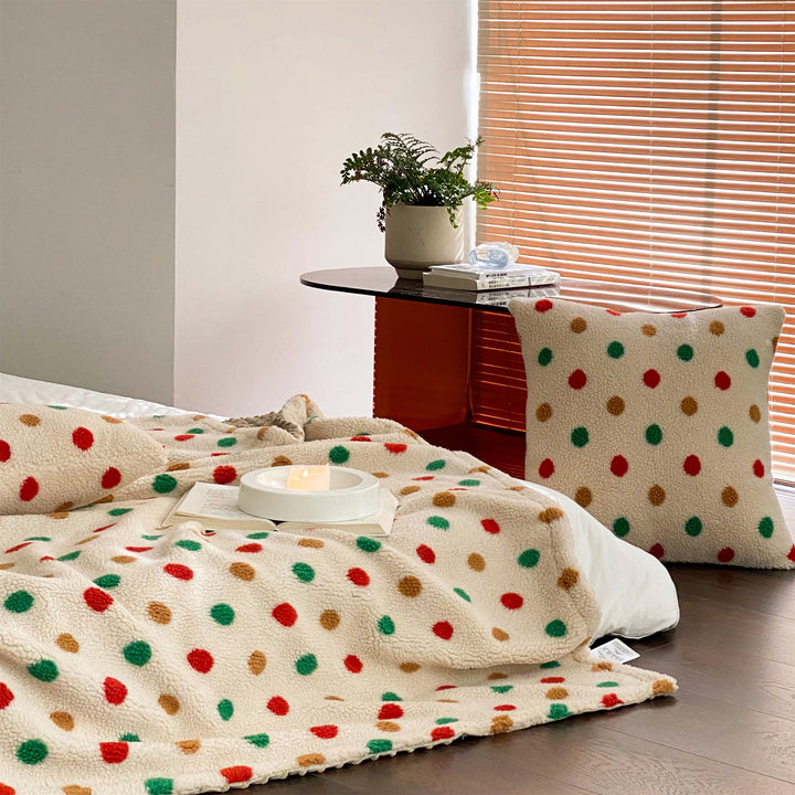 Cozy sherpa throw blanket with colorful dot appliqués and matching cushion cover