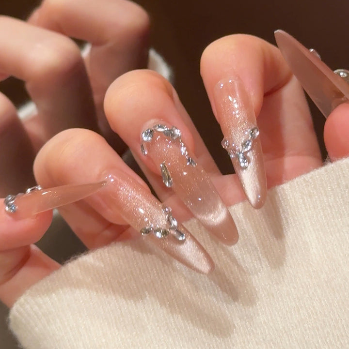 Artistic Stiletto Press-On Nail Art with Glimmering Accents Kalsten