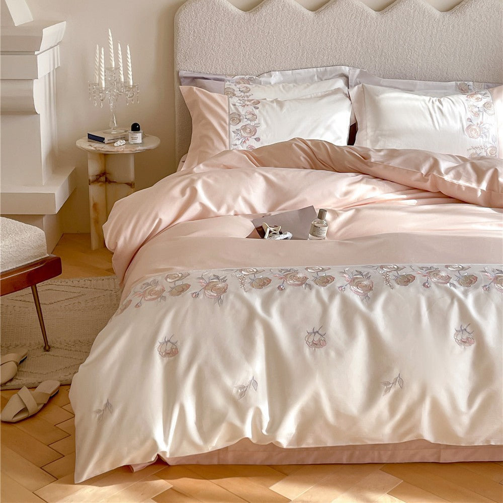 Premium bedding set made of cotton satin with floral border embroidery and reversible function