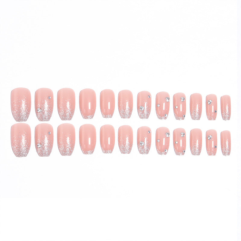 Glamorous artificial nails with glitter and rhinestone embellishments Kalsten