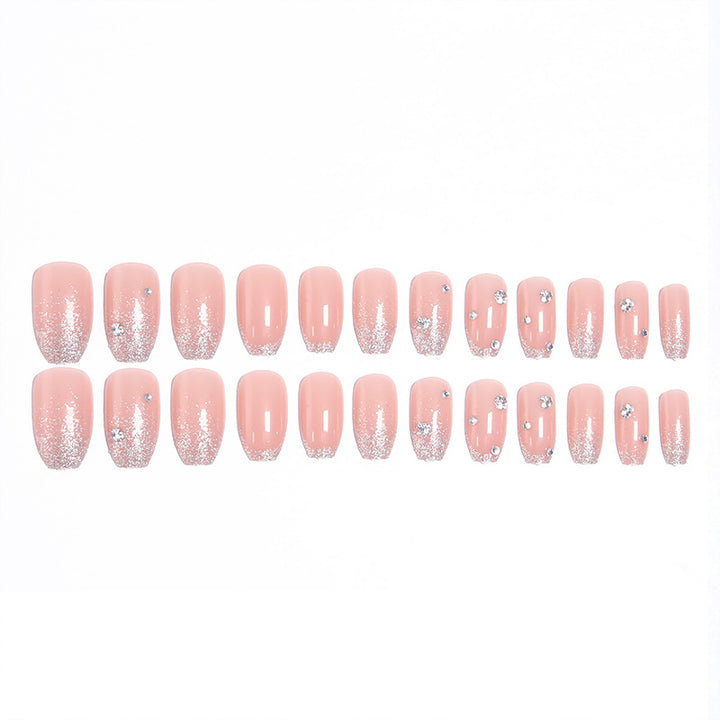 Glamorous artificial nails with glitter and rhinestone embellishments Kalsten
