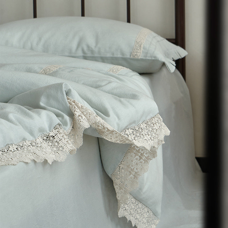 High-quality linen bedding set with handcrafted crochet lace, box pleats, and integrated bed skirt