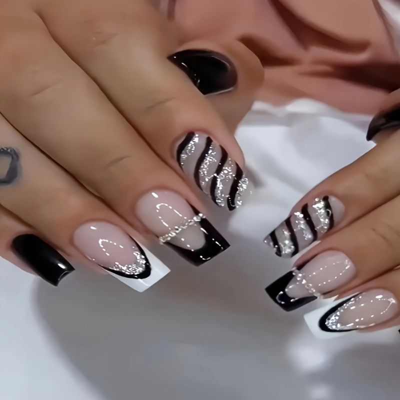 Elegant artificial nails with glitter and stripe accents Kalsten