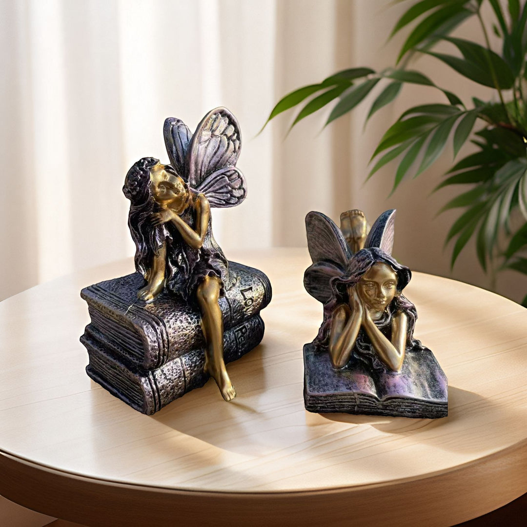 Fairy Figurine Sitting on Books Kalsten