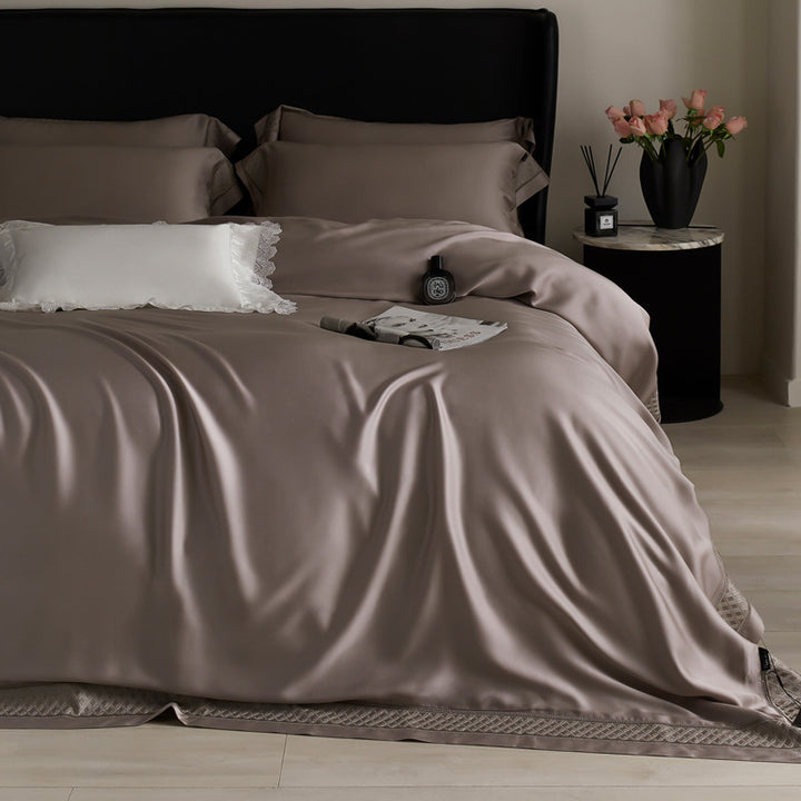 Silky flowing satin bed set with decorative cassette border and extra soft touch