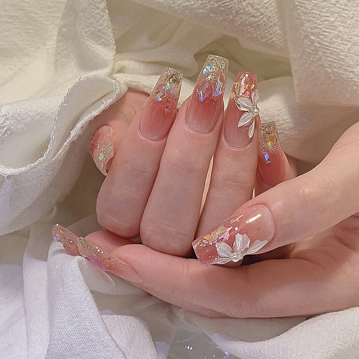 Artificial nail set with floral and glittering accents Kalsten