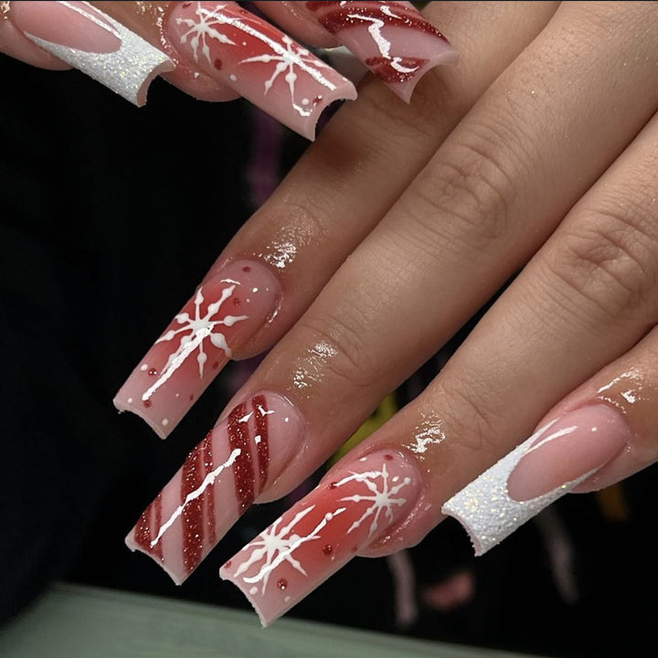 Acrylic nail set with festive candy cane and glitter accents Kalsten