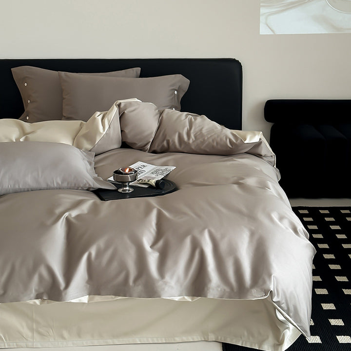 Reversible bedding set made of fine cotton satin with button placket and contrasting back