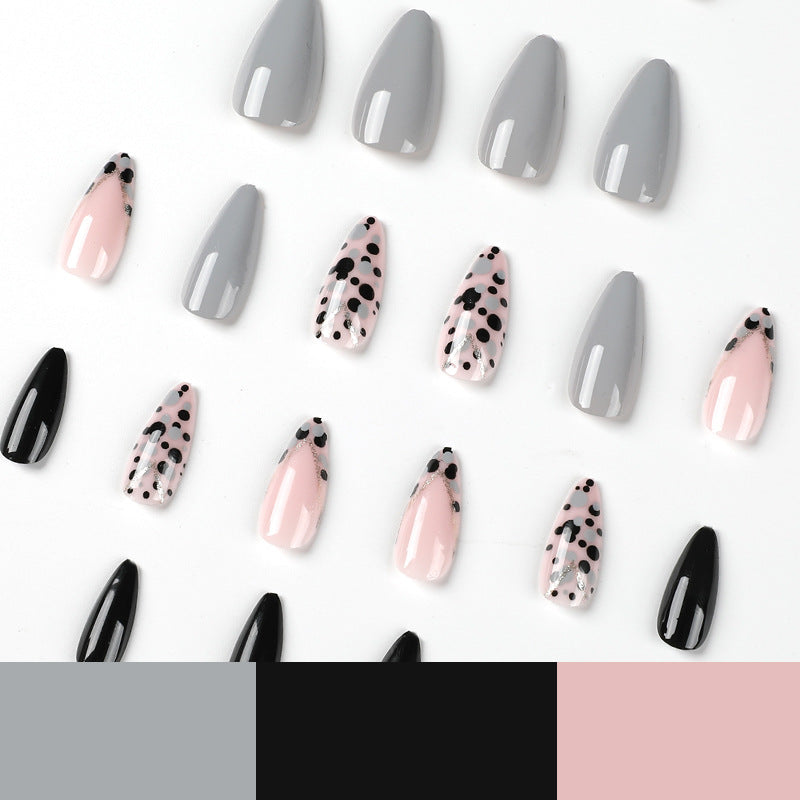 Artful stiletto nails with elegant accent design Kalsten