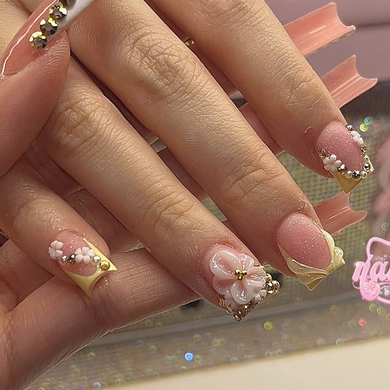 Nail art set with glamorous glitter and flower accents Kalsten