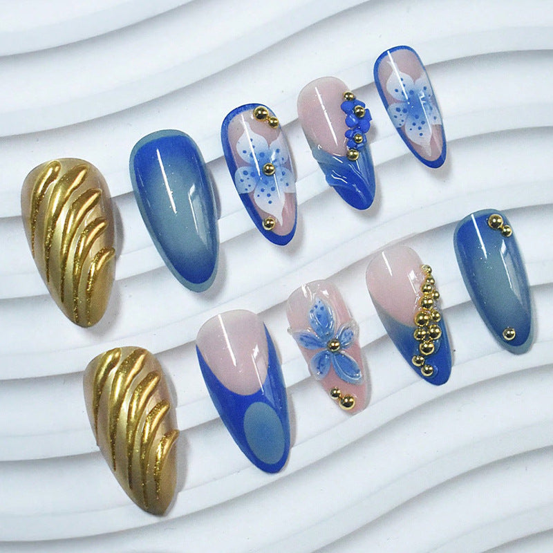 Artistic Press-On Nails with Floral and Metallic Accents Kalsten