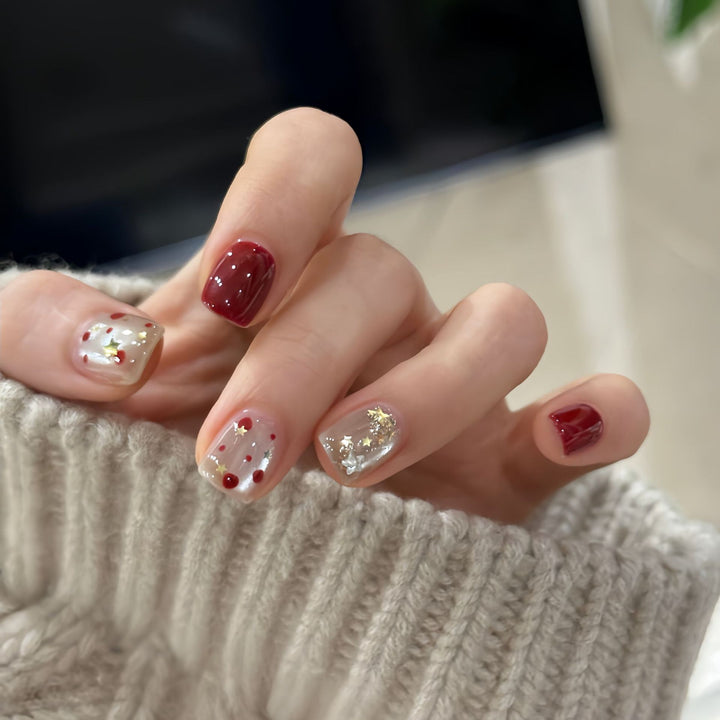 Nail set with sparkling glitter details and creative designs Kalsten