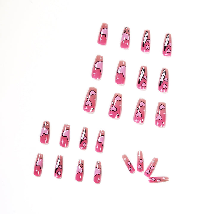 Artful stiletto nails with romantic heart design Kalsten