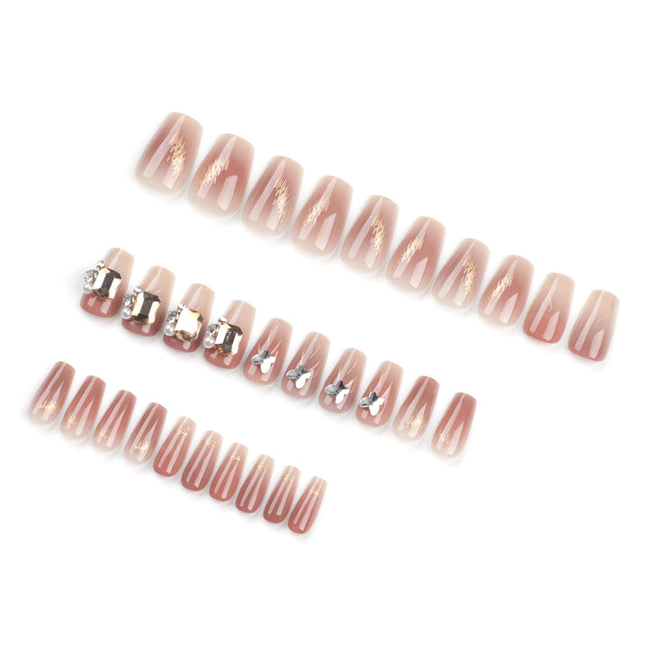 Artificial nail art with elegant jewelry accents Kalsten