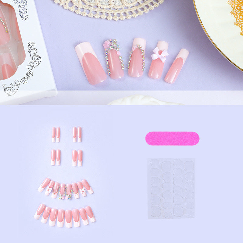Artificial nail set with careful ribbon and glitter decorations Kalsten