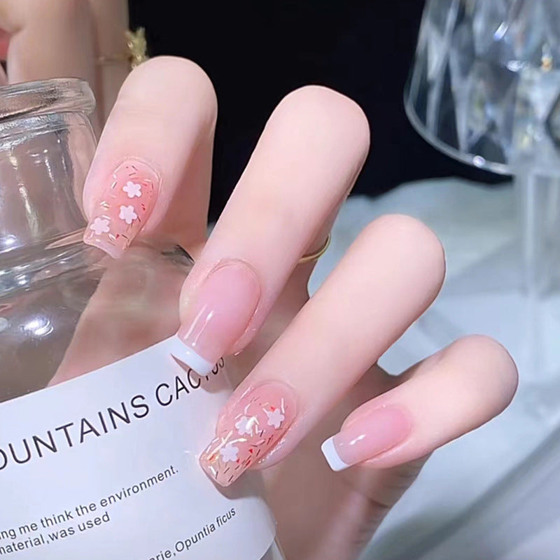 Nail art set with floral decorations and elegant French design Kalsten