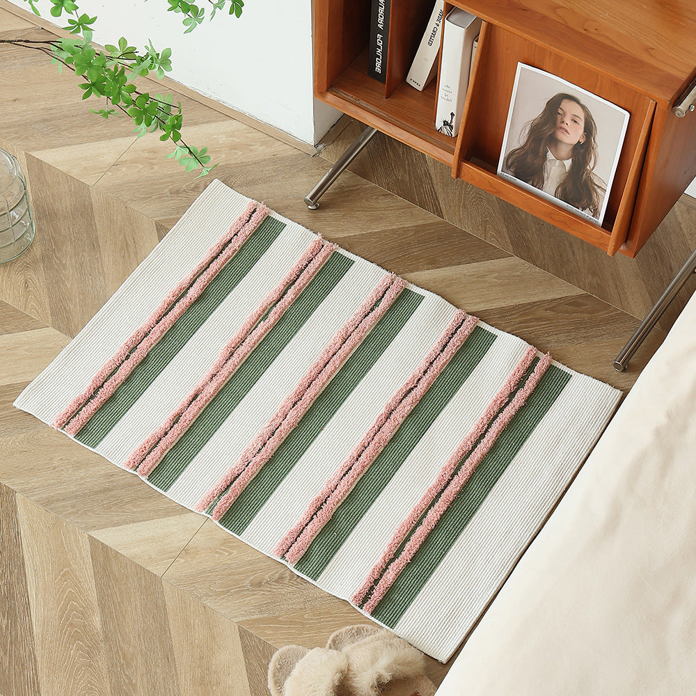 Cotton bath mat with textured stripes and fringes Kalsten