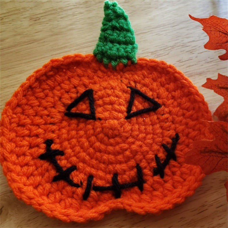 Hand-crocheted pumpkin pot holder and table mat made of cotton yarn