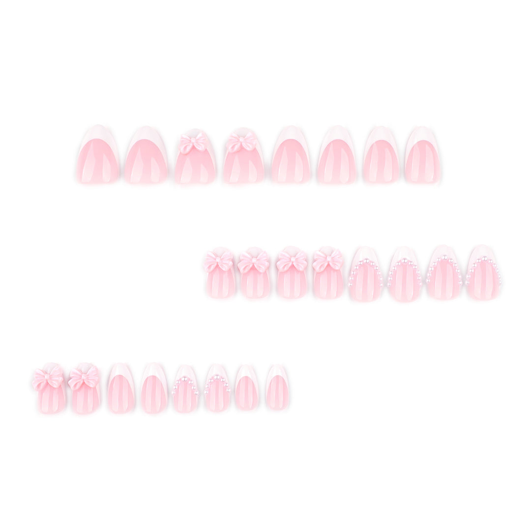 Artful Stiletto Nails with Delicate Bow Accents Kalsten