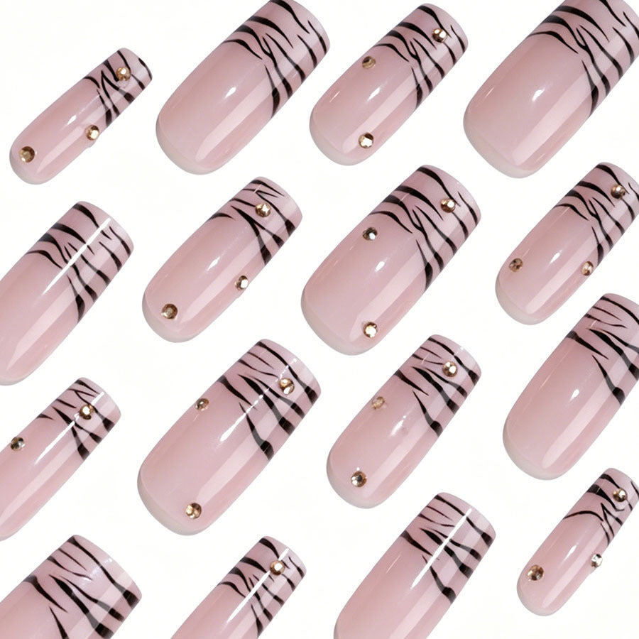 Art nail set with elegant lines and glitter accents Kalsten