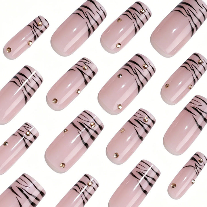 Art nail set with elegant lines and glitter accents Kalsten