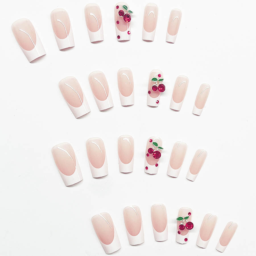 Acrylic nail set with chic cherry motifs and elegant French tip Kalsten