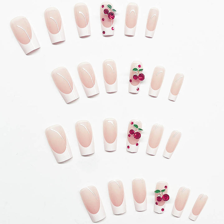 Acrylic nail set with chic cherry motifs and elegant French tip Kalsten