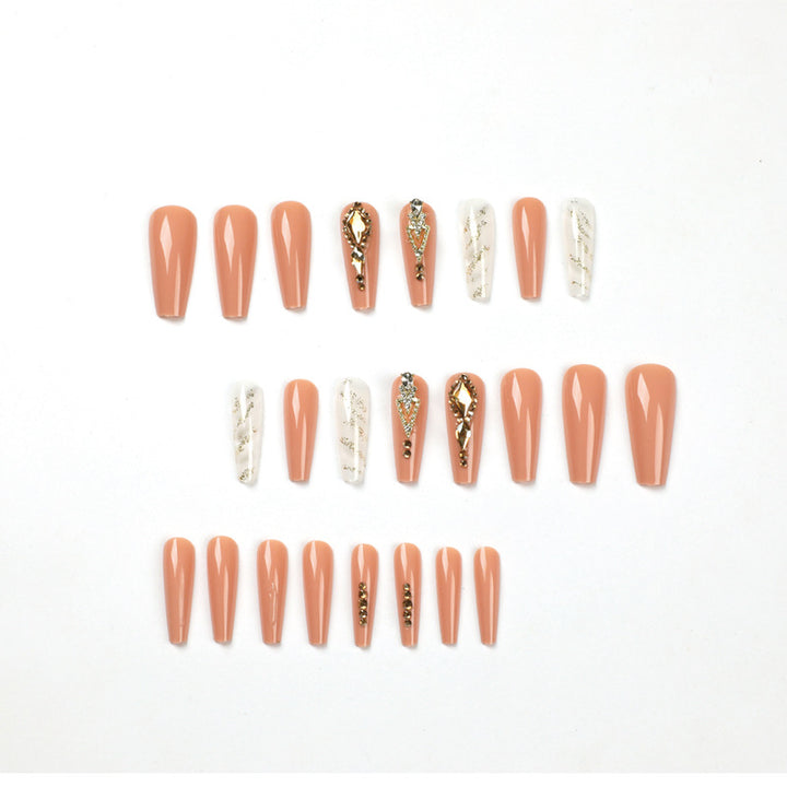 Artful nail extensions with glitter embellishments and delicate accents Kalsten