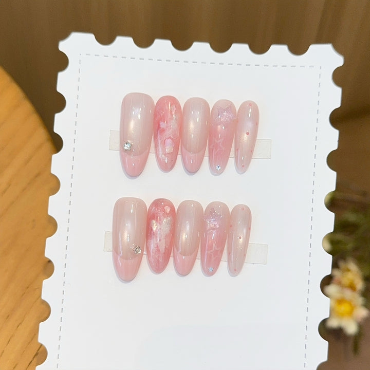 Artificial nails with delicate glitter and star motifs Kalsten