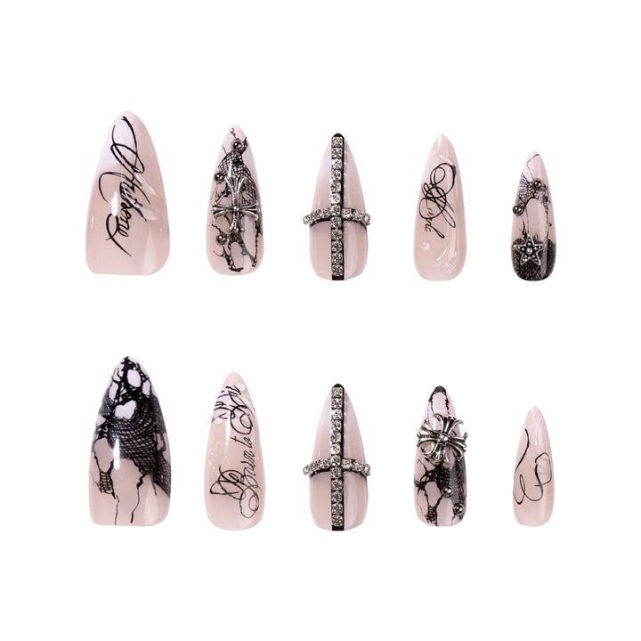 Artful stiletto nails with elegant embellishments Kalsten