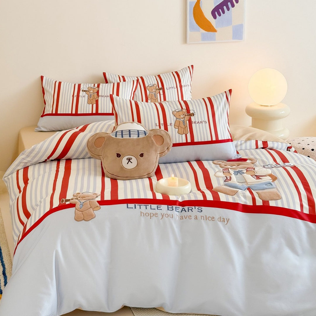 Children's bedding set with embroidered teddy bear design and fine stripes