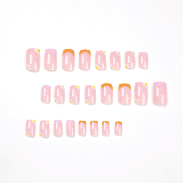 Artistic acrylic nails with floral design and creative color accents Kalsten
