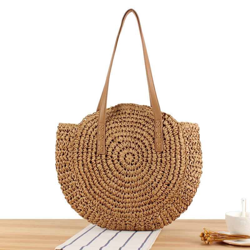 Round straw bag with leather handles Kalsten