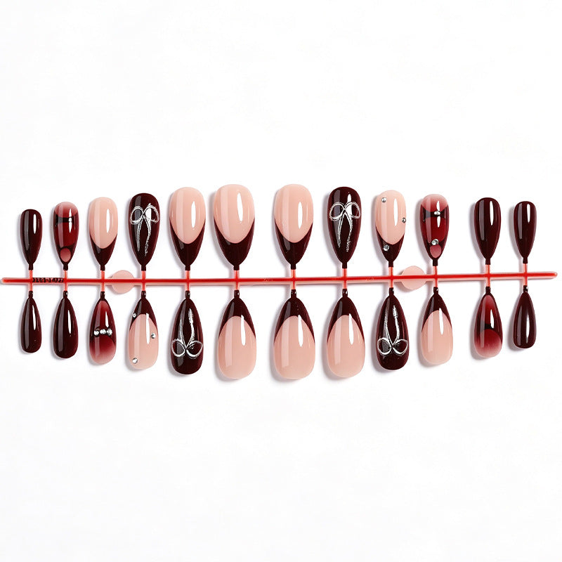Creative nail art set with elaborate two-tone effect and elegant embellishments Kalsten