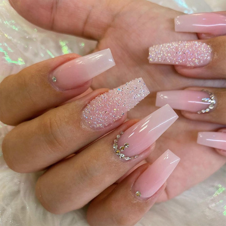 Artificial nail set with sparkling glitter effects and delicate winter motif Kalsten
