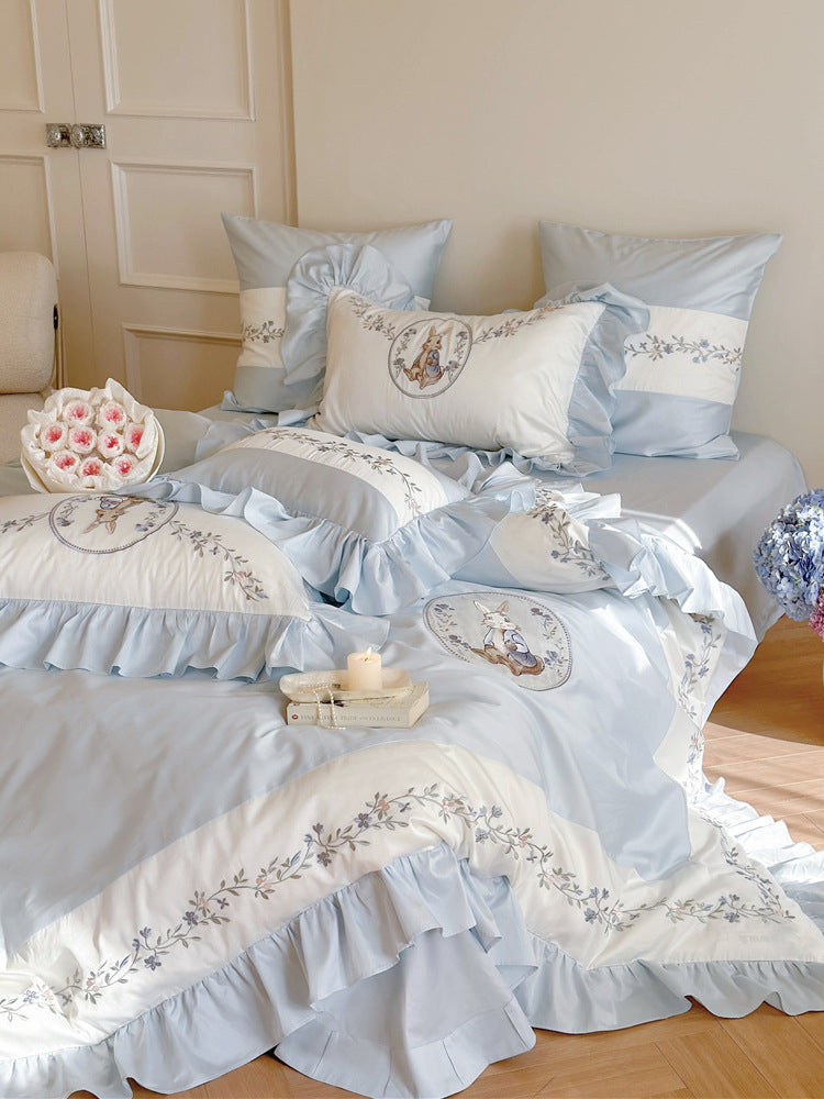 Bedding set with romantic ruffle edge and delicate embroidery