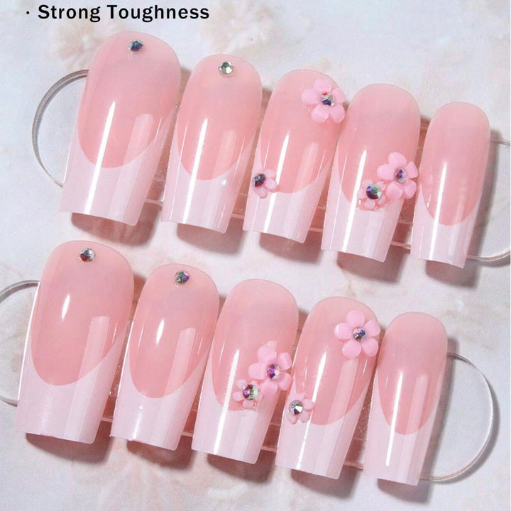 Artificial nail set with elegant 3D flowers and glamorous rhinestone accents Kalsten